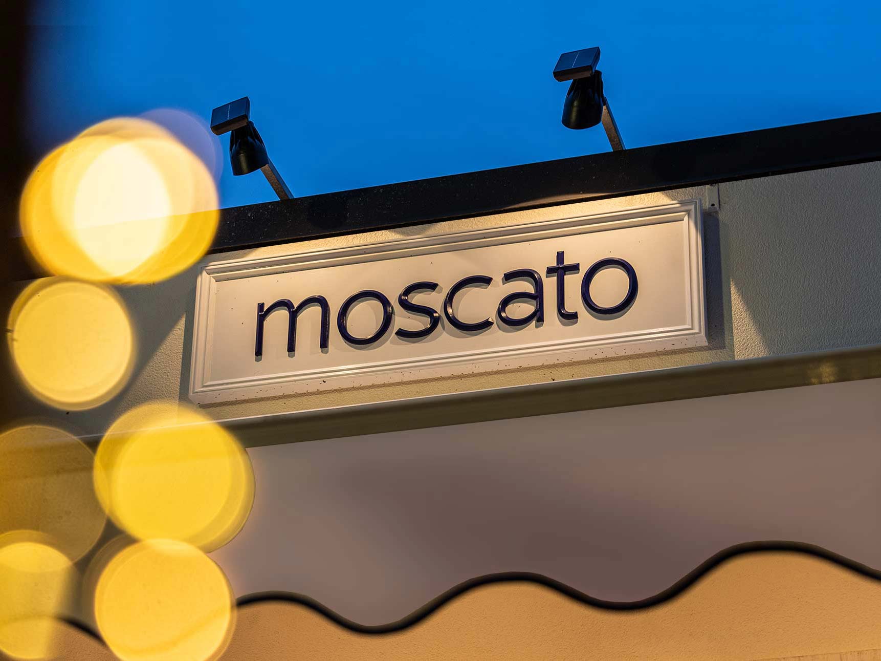 Moscato front entrance sign